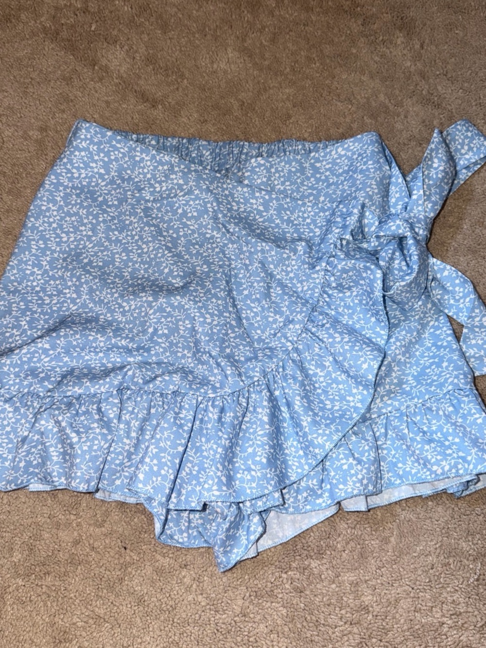 blue floral skort with cute bow tie on side size XS